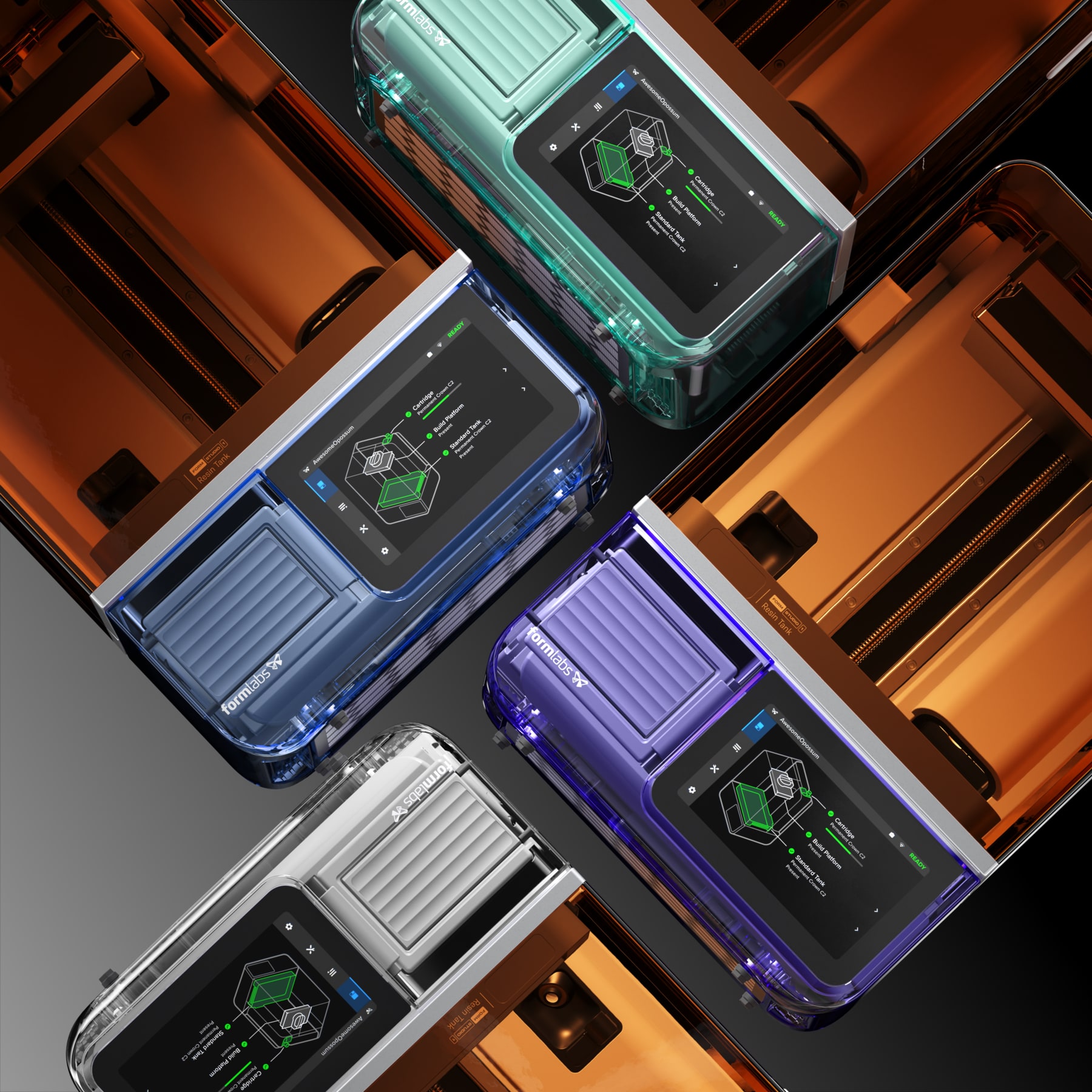 俯视排列的 Formlabs 设备，橙色上盖与彩色透明前面板形成对角线构图